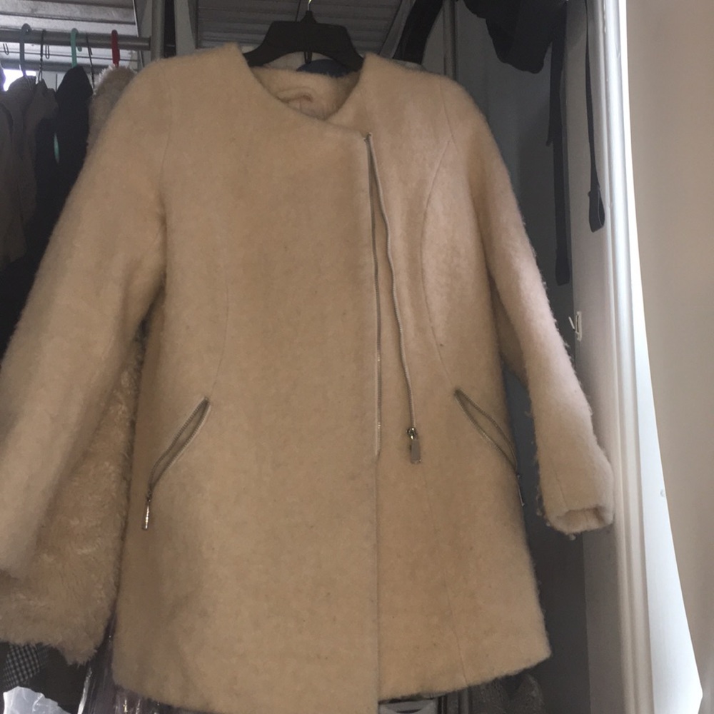 Creamy white colored long jacket